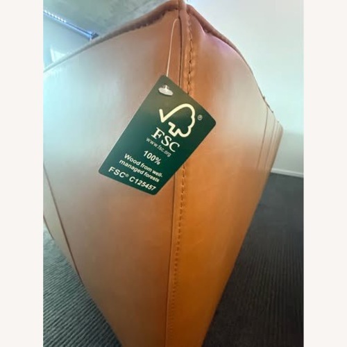 Used Crate & Barrel Wells Grande Leather Sofa + Ottoman – Cayenne for sale on AptDeco