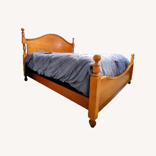 Used Lebow Furniture Wood King Bed for sale on AptDeco