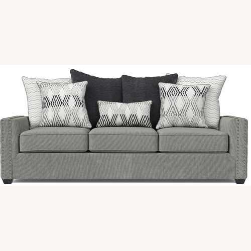 Used Rooms To Go Natalia Light Gray Fabric Loveseat Sofa for sale on AptDeco