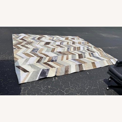 Used Custom Hair on Hide Area Rug for sale on AptDeco