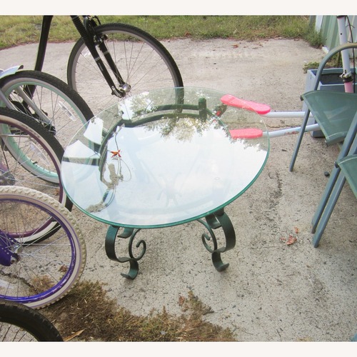 Used Glass Coffee Table Indoor/Outdoor for sale on AptDeco