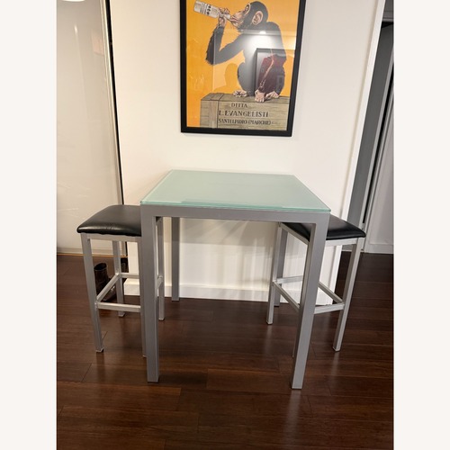 Used Frosted Glass High Top Table and Stools (2) for sale on AptDeco