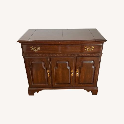 Used Ethan Allen Dark Brown Wood Sideboard for sale on AptDeco