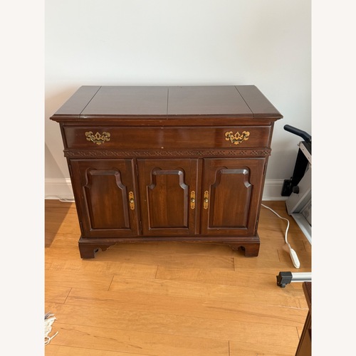Used Ethan Allen Dark Brown Wood Sideboard for sale on AptDeco