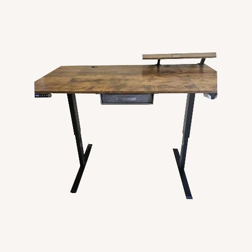 Used Lasherrie Dark Brown Wood Desk for sale on AptDeco
