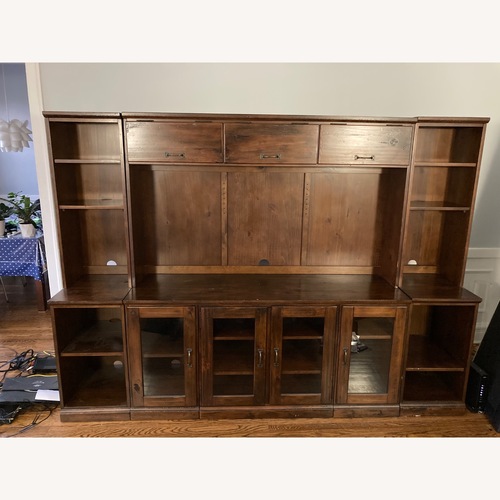 Used Pottery Barn Dark Brown Wood Wall Unit for sale on AptDeco