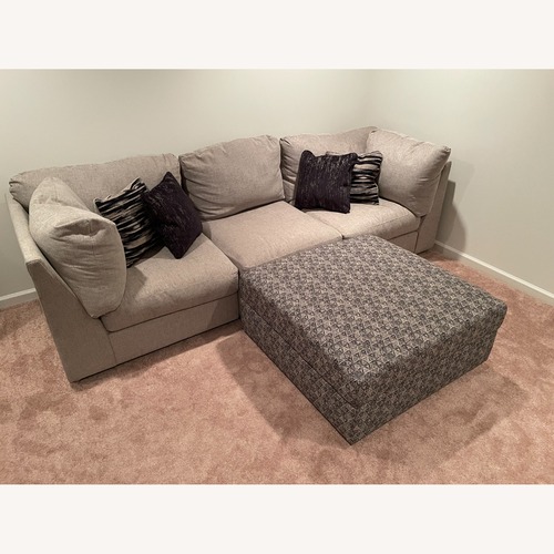 Used Ashley Furniture Kellway Beige Modular Couch & Ottoman for sale on AptDeco
