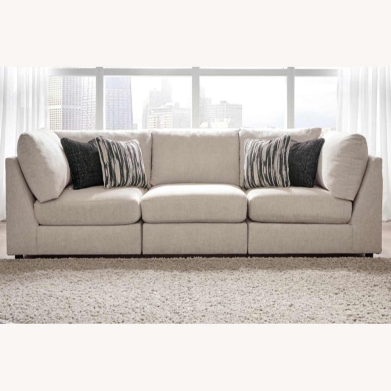 Ashley Furniture Kellway Beige Modular Couch & Ottoman - image-0