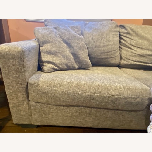 Used Ashley Furniture Gray Fabric Sleeper Sofa for sale on AptDeco