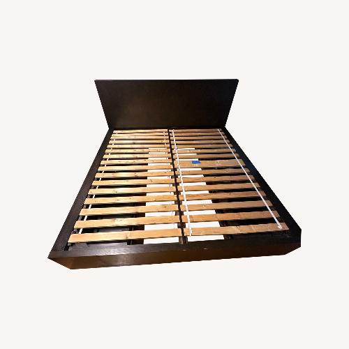 Used West Elm Dark Brown Wood King Bed for sale on AptDeco