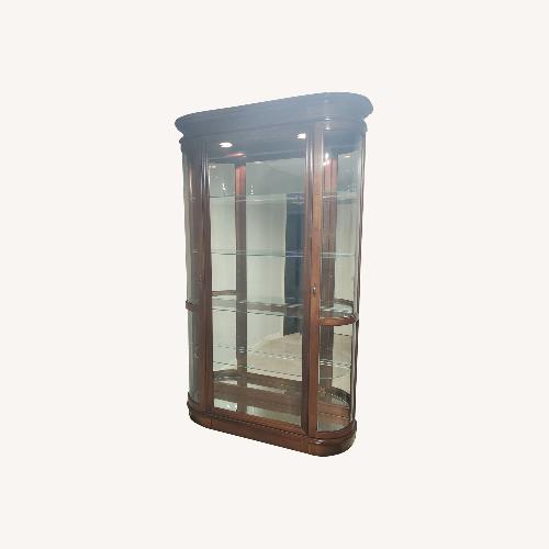 Used Pulaski Furniture Dark Brown Wood Armoire for sale on AptDeco