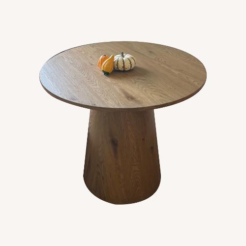 Used Natural Wood Veneer Dining Table for sale on AptDeco