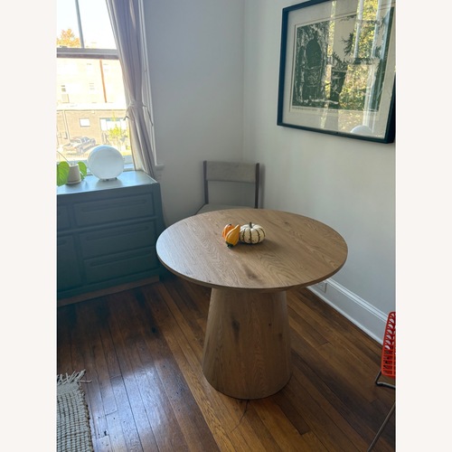 Used Natural Wood Veneer Dining Table for sale on AptDeco