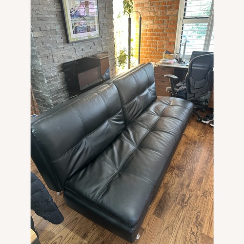 Used Lifestyle Solutions Black Leather Futon for sale on AptDeco