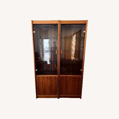Used Mid Century Modern Light Brown Wood Armoire for sale on AptDeco