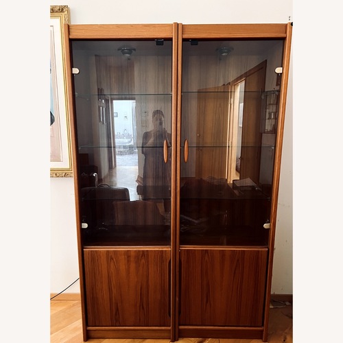 Used Mid Century Modern Light Brown Wood Armoire for sale on AptDeco