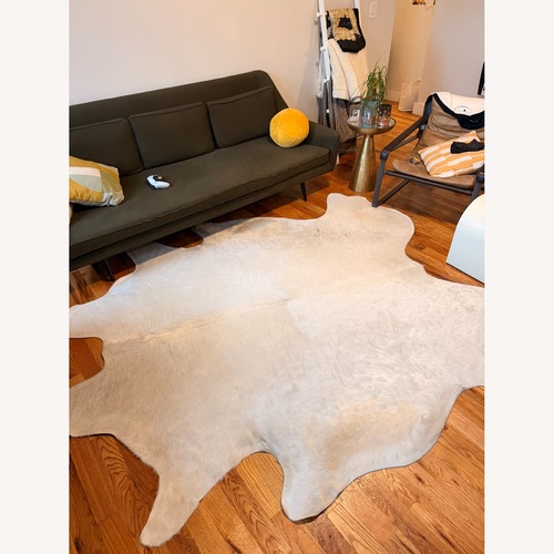 Used Natural Fur and Hide Area Rug 6' x 9' for sale on AptDeco