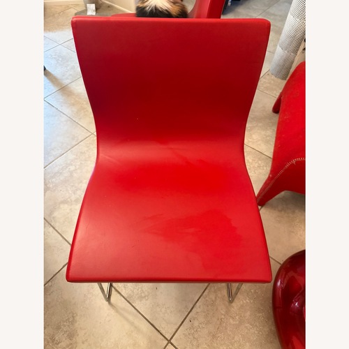 Used Ligne Roset Modern Red Dining Chair for sale on AptDeco