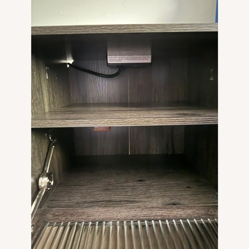 Used Amazon Dark Gray Nightstand for sale on AptDeco