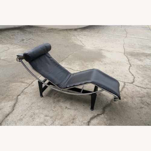 Used Cassina LC4 Black Leather Chaise Lounge Chair for sale on AptDeco