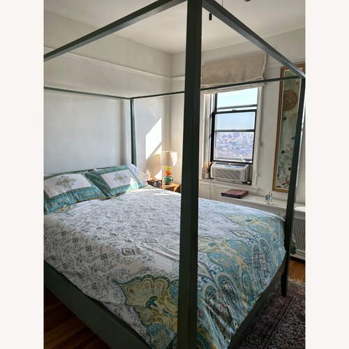 Used Grange Green Wood Queen Bed for sale on AptDeco