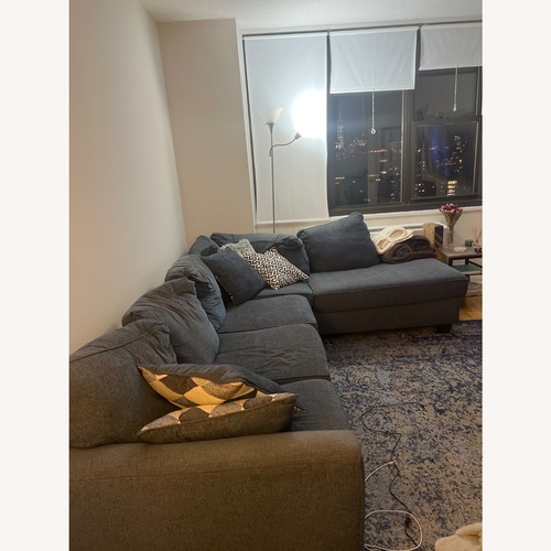 Used Dark Blue Sectional for sale on AptDeco