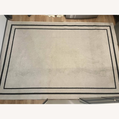 Used Beige 7x9 Area Rug for sale on AptDeco