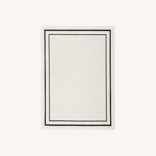 Used Beige 7x9 Area Rug for sale on AptDeco