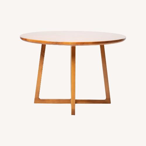 Used Ellis Light Brown Wood Dining Table for sale on AptDeco