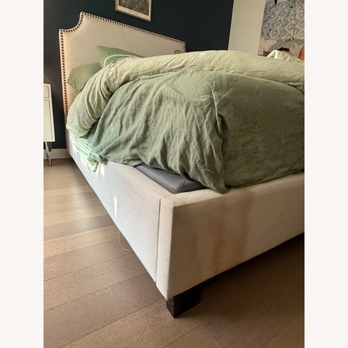 Used Pottery Barn Natural Fabric Queen Bed for sale on AptDeco