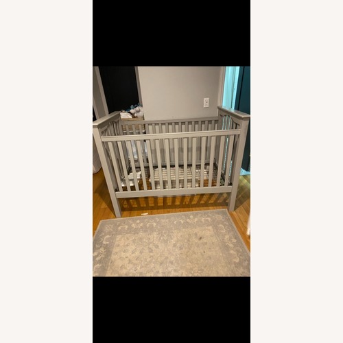 Used Pottery Barn Light Gray Wood Crib for sale on AptDeco