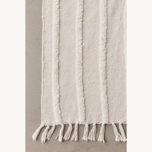 Used Urban Outfitters Modern Hilo Tufted Rug for sale on AptDeco