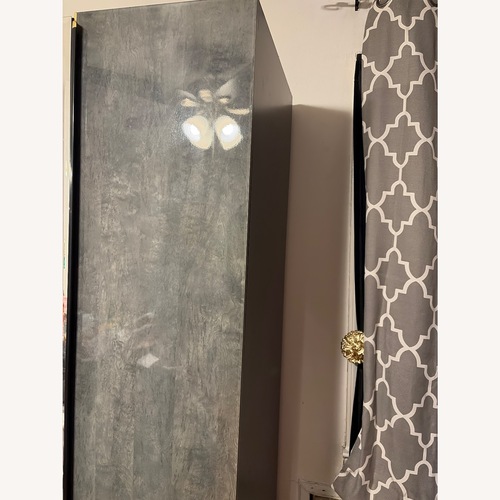 Used Raymour & Flanigan Dark Gray Wood Armoire for sale on AptDeco