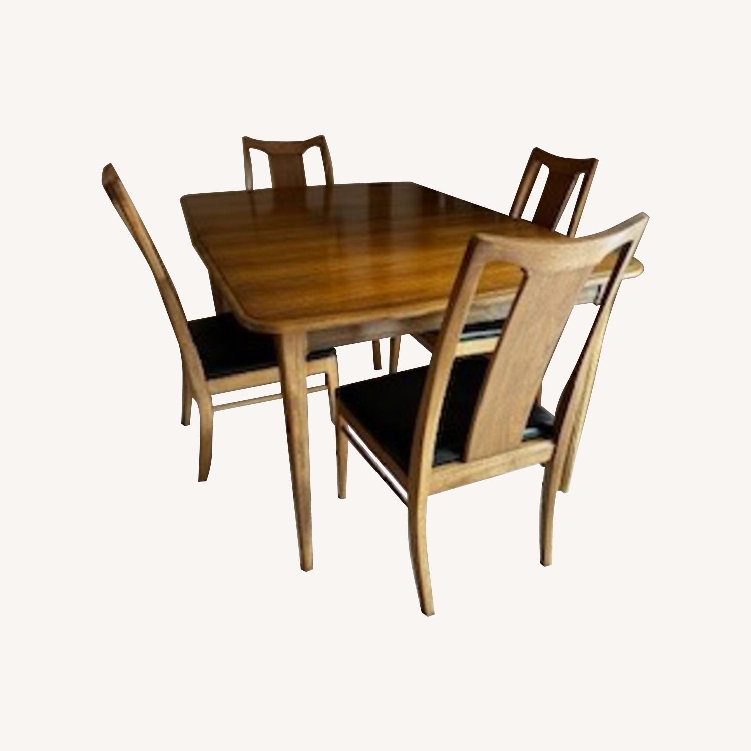Dining Room Table and Six Chairs Plus 2 Leaves - image-0