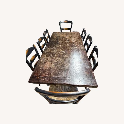 Used Black Wood Dining Table for sale on AptDeco