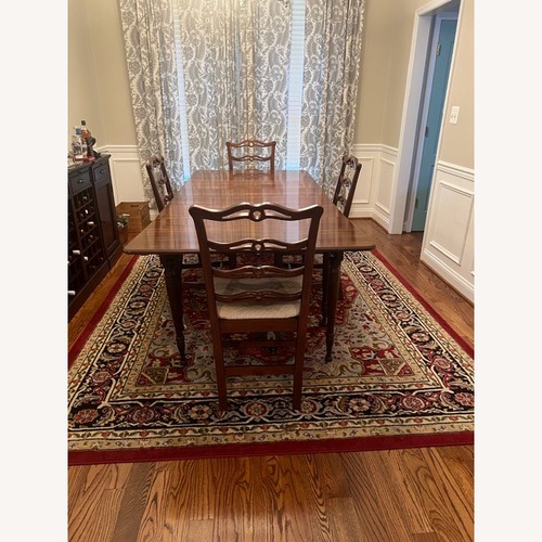 Used Wooden Dining Room Table with 4 Chairs for sale on AptDeco