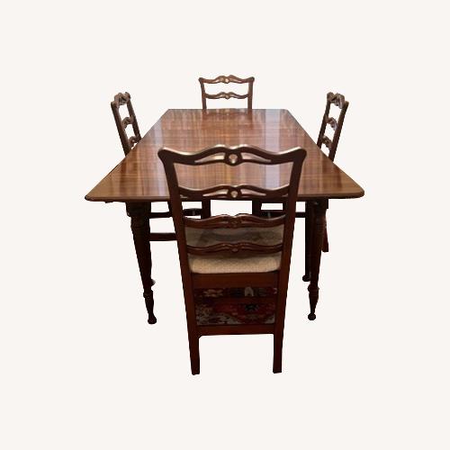 Used Wooden Dining Room Table with 4 Chairs for sale on AptDeco