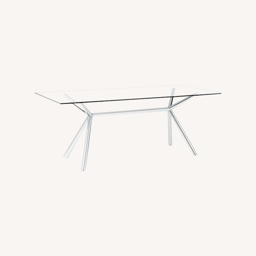 Used West Elm Glass Chrome Trestle Dining Table for sale on AptDeco