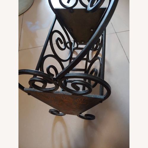 Used Powell Furniture Dark Brown Metal Décor for sale on AptDeco