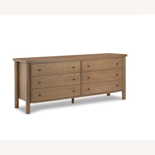 Used Four Hands Roarke Dark Brown Wood Veneer Dresser for sale on AptDeco