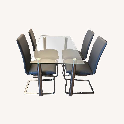 Used Glass Dining Table and 4 Chairs for sale on AptDeco