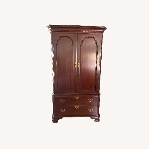 Used Ethan Allen Dark Brown Wood Armoire for sale on AptDeco