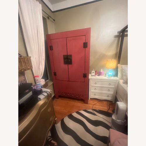Used ABC Carpet and Home Pink Antique Wood Armoire for sale on AptDeco