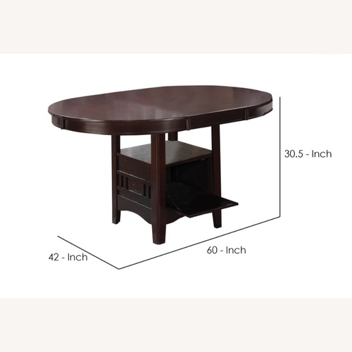 Used Ashley Furniture Dark Brown Dining Table for sale on AptDeco