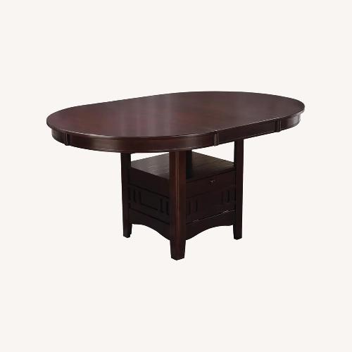 Used Ashley Furniture Dark Brown Dining Table for sale on AptDeco