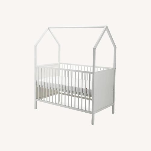 Used Stokke Home Bed Crib - White  for sale on AptDeco