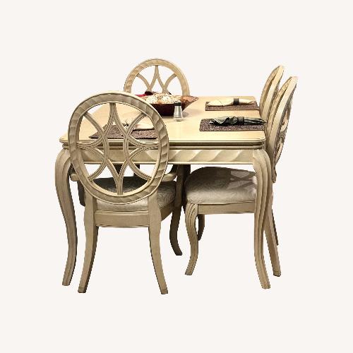 Used Light Brown Wood Dining Set for sale on AptDeco