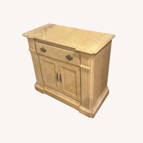 Used Light Brown Wood Armoire for sale on AptDeco