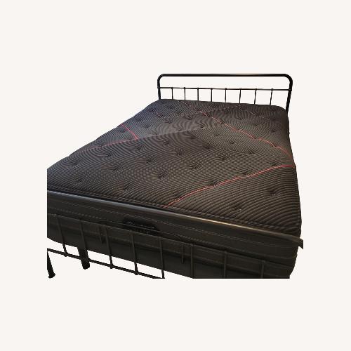 Used Black Queen Bed for sale on AptDeco