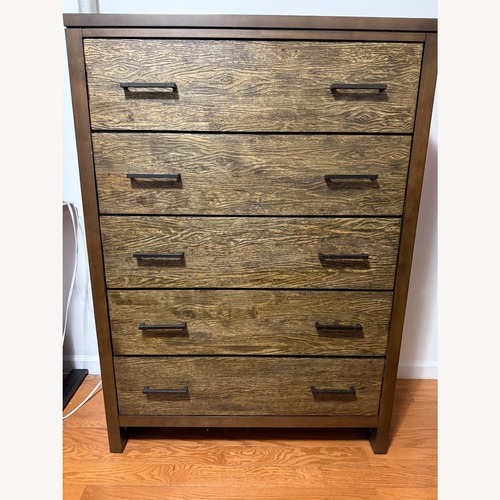 Used Raymour & Flanigan Dark Brown Wood Dresser for sale on AptDeco